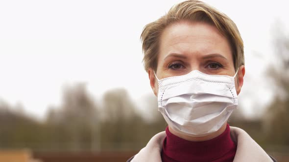 Young Woman Wearing Protective Medical Mask