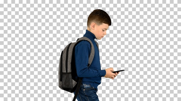 Schoolboy with a backpack using mobile, Alpha Channel