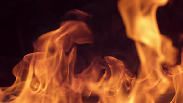 Closeup of fire burning on black background in slow motion; shot on Phantom Flex 4K at 1000 fps alt