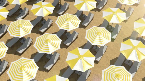 Empty Sunbeds and Colorful Umbrellas on the Beach