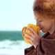 Beautiful Redhead Girl Walking Near the Sea - VideoHive Item for Sale