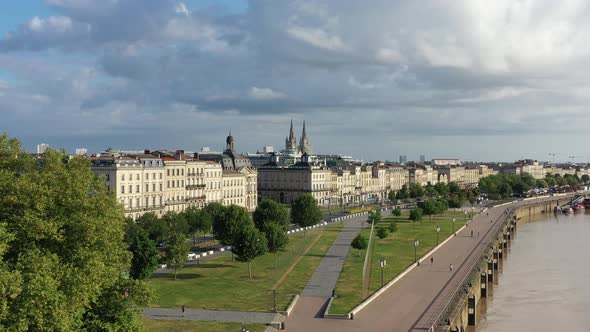 a View From the Top of the Bordeaux Embankment and the People Walking Along It