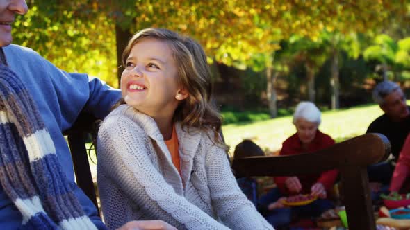 Grandfather playing with his grand daughter