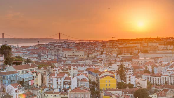 Lisbon at Sunset Aerial Panorama View of City Centre with Red Roofs at Autumn Evening Timelapse