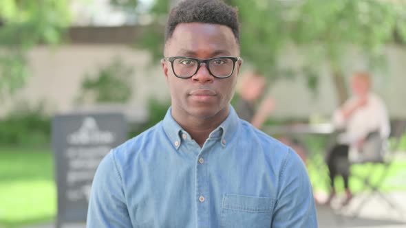 Portrait of African Man Looking at Camera