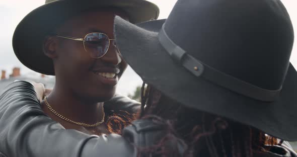 Close Up Portrait of Afroamerican Young Man and Woman Embrace Outdoor