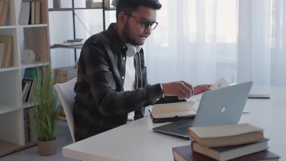 Account Manager Data Checking Man Graphs Desk