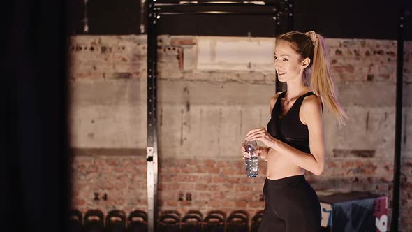 Female Athlete Taking Break From Workout