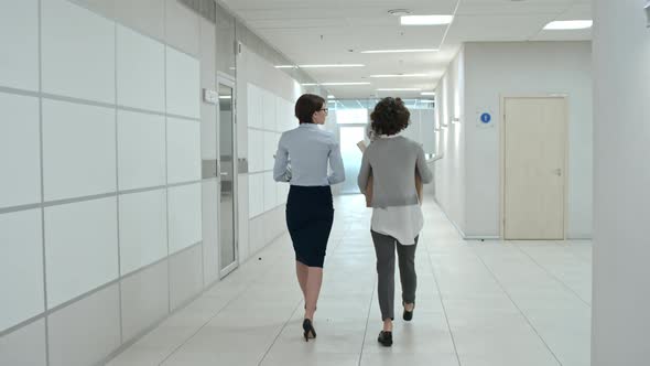 Women Going to New Office