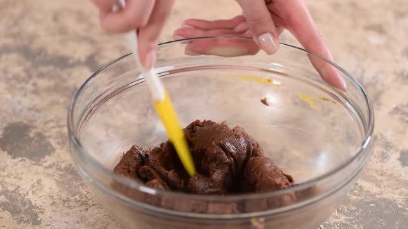 Preparing Chocolate Choux Dough in Bowl, Adding Eggs To the Dough