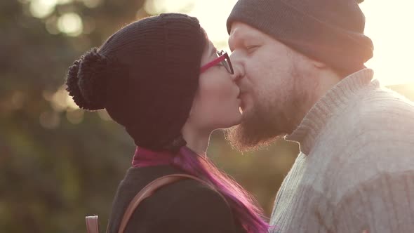 Young Smiling Couple Kissing in Sunshine