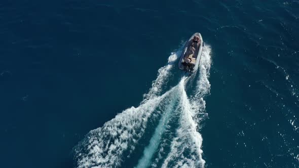 Three Young Adults on Boat Trip Aerial