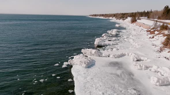 Frozen Waters Of Lake Superior In Minnesota Coast - aerial shot