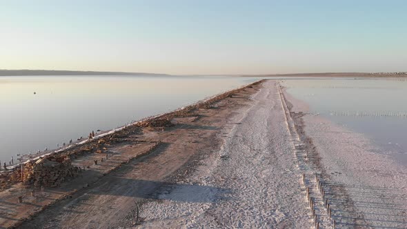 Aerial view of Kuyalnik Estuary with salt and old wooden piles on sunny day and good weather