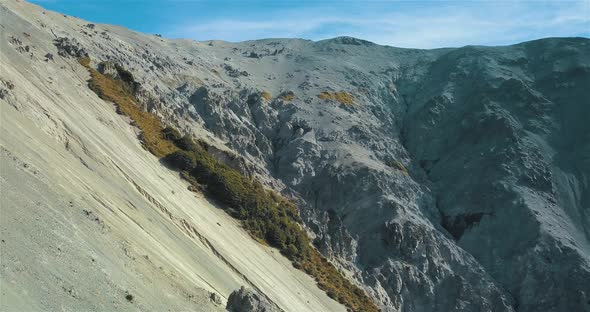 Drone Flying Next To Mountain Near Edwards River New Zealand