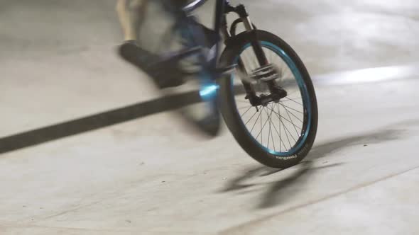 MTB Bicycle Rider Does Various Tricks While Riding in Skatepark 