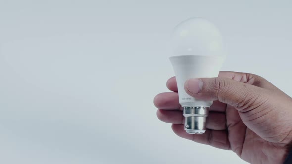 Hand Holds Led Light Bulb
