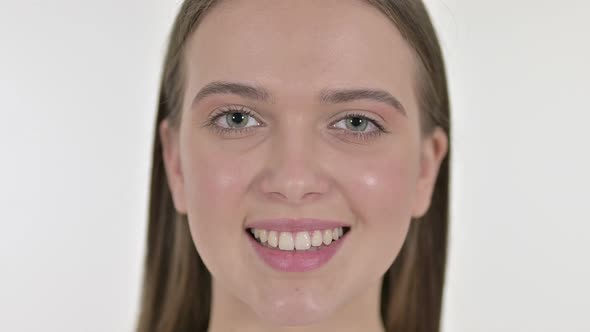 Close Up of Smiling Face of Beautiful Young Woman