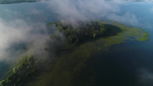 Flight in the Clouds Over the Island of Lake Svityaz