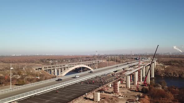 Construction of new bridges across the Dnieper River in Zaporozhye. Ukraine. City landscape.