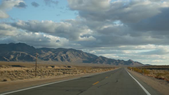 Road Trip Driving Auto From Death Valley to Las Vegas Nevada USA