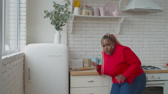 Overweight African Female Caught Near Refrigerator