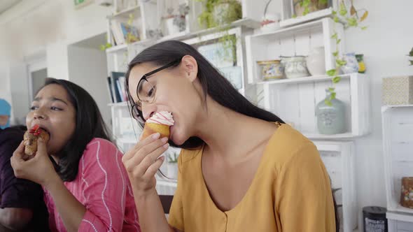 Two Woman Having Breakfast with Friends