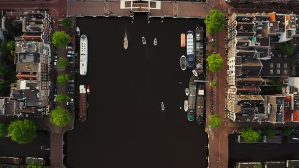 Top View of the Pier with Moored Ships on the Canal in Amsterdam