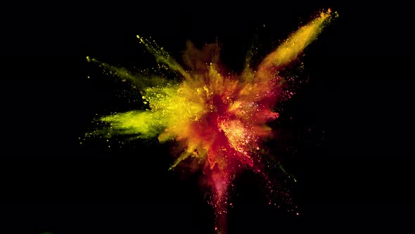 Super Slowmotion Shot of Color Powder Explosions Isolated on Black Background