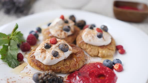 Vegan Breakfast - Tofurniki - Russian Cheesecakes With Sour Cream And Berries.