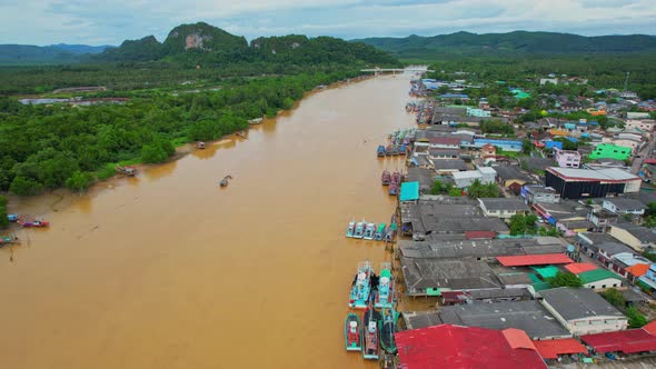 An aerial view over the river, fishing villages and fishing boats