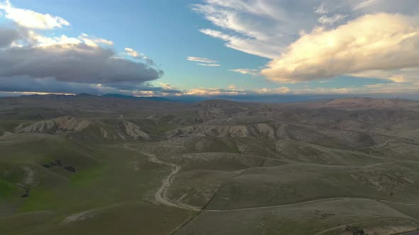 4K UHD Aerial drone view beautiful sky before sunset over mountains