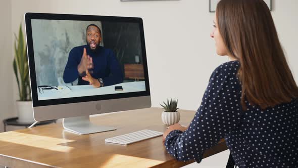 Woman Using Computer App for Video Connection