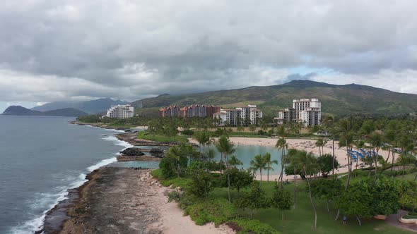 Rising aerial shot of coastal lagoons in Ko'Olina on the island of O'ahu, Hawaii. 4K