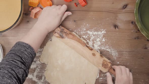 Step by step. Rolling out dough for pie crust.