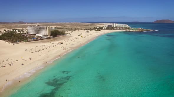 Aerial view of Corralejos Big Beaches with turquoise sea in Fuerteventura.