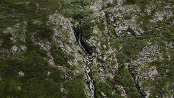 Waterfall in mountains of Altai