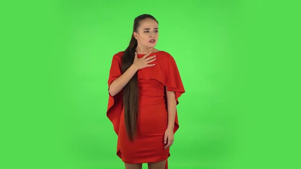 Pretty Young Woman Is Showing Disgust for Bad Smell or Taste. Green Screen