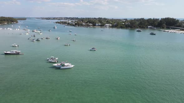 aerial, sandbar social, boaters in Sarasota, Florida relax near Jewfish Key