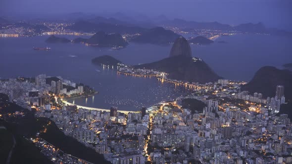 tilt down night shot of botafogo and sugarloaf mountai in rio de janeiro, brazil