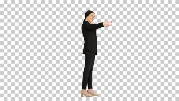 Smiling Businesswoman taking selfie on her phone, Alpha Channel