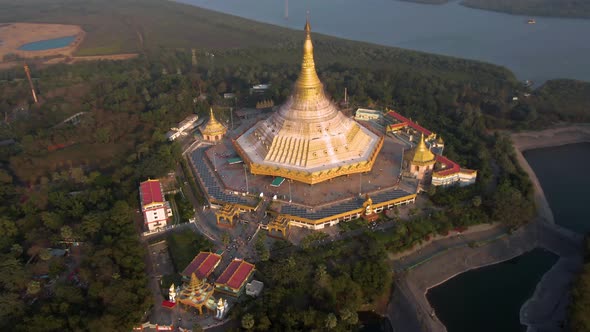 Mumbai, India, "Global Pagoda" temple, 4k aerial drone sunset footage