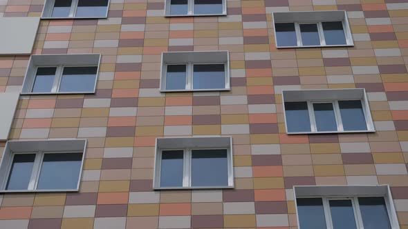 Angle Dolly Shot of Colorful Modern Apartment Building.