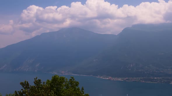 Running clouds over the mountains and lake