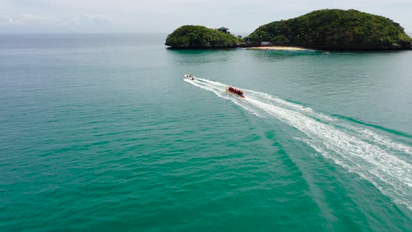 People Ride the Inflatable Watercraft Boat, Philippines