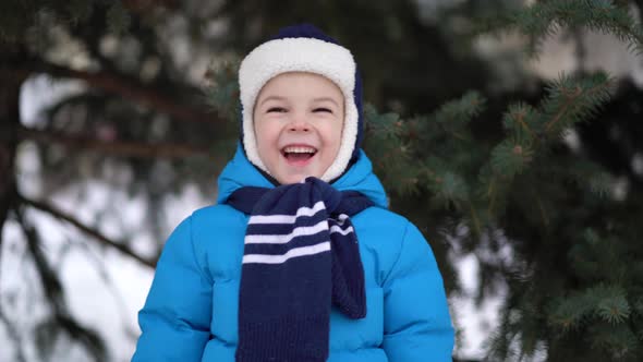 Boy Portrait on Winter Forest