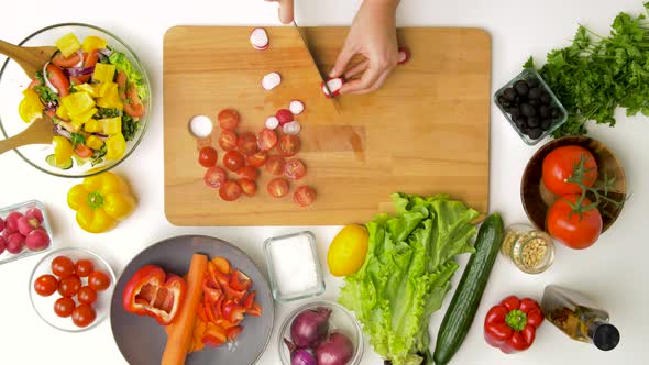 Woman Chopping Vegetables for Salad at Home