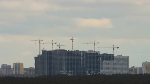 Construction of multi-storey buildings. Time-lapse.