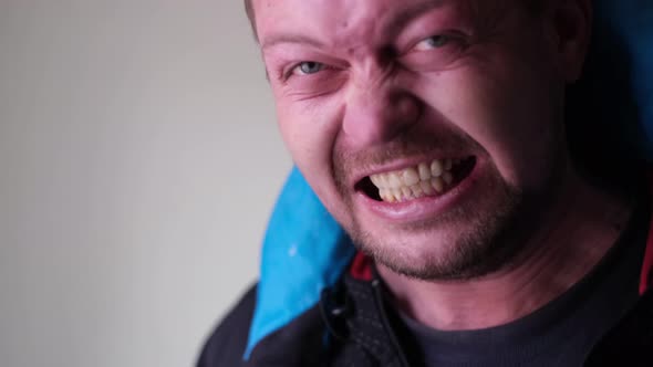 Portrait of an Aggressive Man He Shows His Anger at the Camera