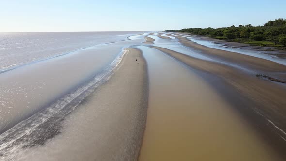 Fast forward aerial shot of sand banks by coast of Rio de la Plata